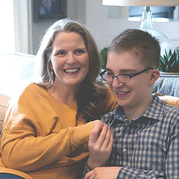 blog creator and her son sitting on a couch