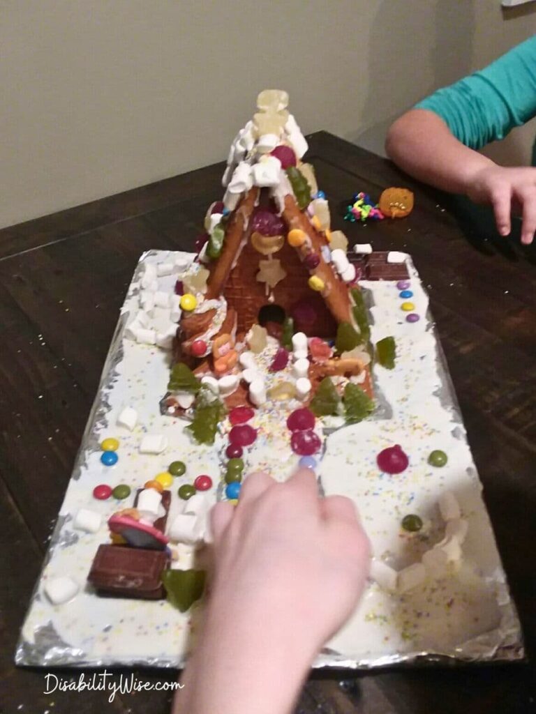 holiday gingerbread house on a table 