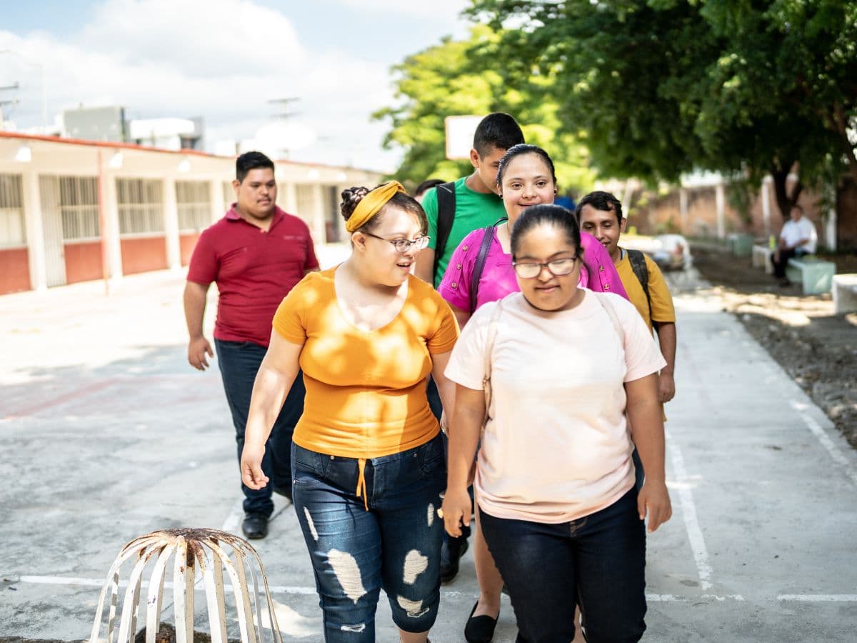 adults with developmental disabilities walking together